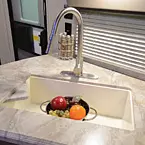 Residential Kitchen Faucet w/
Pull Down Sprayer and Deep Undermount Farm Style Sink May Show Optional Features. Features and Options Subject to Change Without Notice.