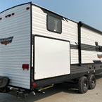 Back non-entry side exterior view of the 30KQBSS with the outside kitchen and power awning closed. May Show Optional Features. Features and Options Subject to Change Without Notice.