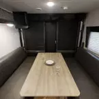 Rear Cargo Area with Dinette Set Up May Show Optional Features. Features and Options Subject to Change Without Notice.