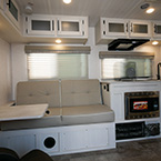 Sofa and kitchen with dinette table May Show Optional Features. Features and Options Subject to Change Without Notice.