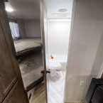 Bunks and bathroom entrance May Show Optional Features. Features and Options Subject to Change Without Notice.