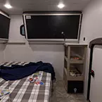 Bunk House Showing Top Beds Flipped Up and Bottom Bed in Sleeping Position May Show Optional Features. Features and Options Subject to Change Without Notice.