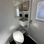 Pedal Flush Toilet, Compact Sink (Stainless), Mirror, Dispensers May Show Optional Features. Features and Options Subject to Change Without Notice.