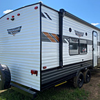 Wildwood X-Lite 241QBXL Rear 3/4 Door Side View May Show Optional Features. Features and Options Subject to Change Without Notice.