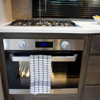  	Oven and range May Show Optional Features. Features and Options Subject to Change Without Notice.