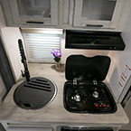 Stovetop with Cover Raised May Show Optional Features. Features and Options Subject to Change Without Notice.