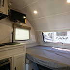 Front set up as a bed May Show Optional Features. Features and Options Subject to Change Without Notice.