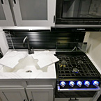 Kitchen sink and stovetop May Show Optional Features. Features and Options Subject to Change Without Notice.