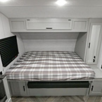 Murphy Bed set up as bed with end table and storage above May Show Optional Features. Features and Options Subject to Change Without Notice.