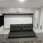 Murphy Bed set up as Sofa with end tables and storage above May Show Optional Features. Features and Options Subject to Change Without Notice.