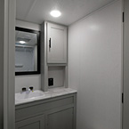 Bathroom toilet, vanity and storage

 May Show Optional Features. Features and Options Subject to Change Without Notice.