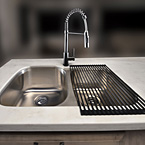 Clean up is quick and easy with stainless steel undermount sinks and this single handle,
pull-out faucet with sprayer. May Show Optional Features. Features and Options Subject to Change Without Notice.