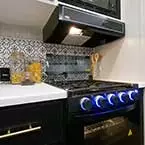 Kitchen stove May Show Optional Features. Features and Options Subject to Change Without Notice.