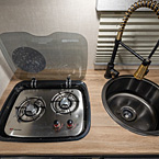 Kitchen Sink and Cooktop May Show Optional Features. Features and Options Subject to Change Without Notice.