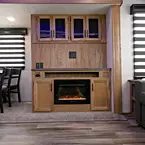 TV Prep with Storage Above and Fireplace Below May Show Optional Features. Features and Options Subject to Change Without Notice.
