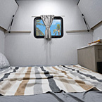 Versa Bunks with Bunks Up May Show Optional Features. Features and Options Subject to Change Without Notice.