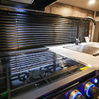Close up of stove May Show Optional Features. Features and Options Subject to Change Without Notice.