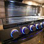 Close up of stove May Show Optional Features. Features and Options Subject to Change Without Notice.