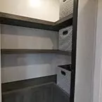 Hidden Storage Behind Entertainment Center May Show Optional Features. Features and Options Subject to Change Without Notice.