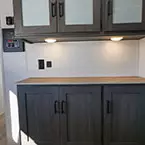 Front Facing Storage with Overhead Cabinet May Show Optional Features. Features and Options Subject to Change Without Notice.