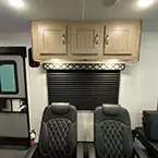Overhead storage cabinets over two reclining lounge chairs next to entry door May Show Optional Features. Features and Options Subject to Change Without Notice.