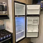 10 cu ft, 12V refrigerator with doors shown open May Show Optional Features. Features and Options Subject to Change Without Notice.