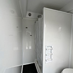 Combo Restroom with Toilet and Shower May Show Optional Features. Features and Options Subject to Change Without Notice.