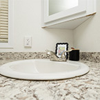Bathroom Sink May Show Optional Features. Features and Options Subject to Change Without Notice.