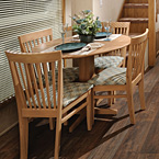 Whether you are enjoying your favorite meal or playing an exciting game we have the perfect place. Our solid hardwood kitchen table features a drop leaf and four chairs. The chairs also offer lumbar support for additional comfort. May Show Optional Features. Features and Options Subject to Change Without Notice.